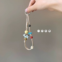 Xiaohongshu の同じスタイルの春の子犬携帯電話ストラップオイルワックスロープ携帯電話チェーン紛失防止耐久性のあるポータブルクロスボディショートユニバーサル