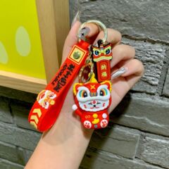 目を覚ましたライオンの鍵は猫の公仔のカバンを掛けてかわいいキーチェーンの竜猫のトラの漫画の小さいペンダントの国の潮のパンダを飾ります。