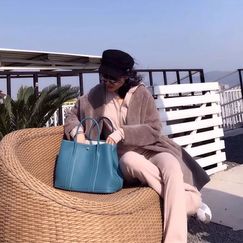 A generation of new cowhide women's bag shoulder diagonal simple garden bag portable bag shopping bag bucket bag A generation of new cowhide women's bag shoulder diagonal simple garden bag portable bag shopping bag bucket bag
