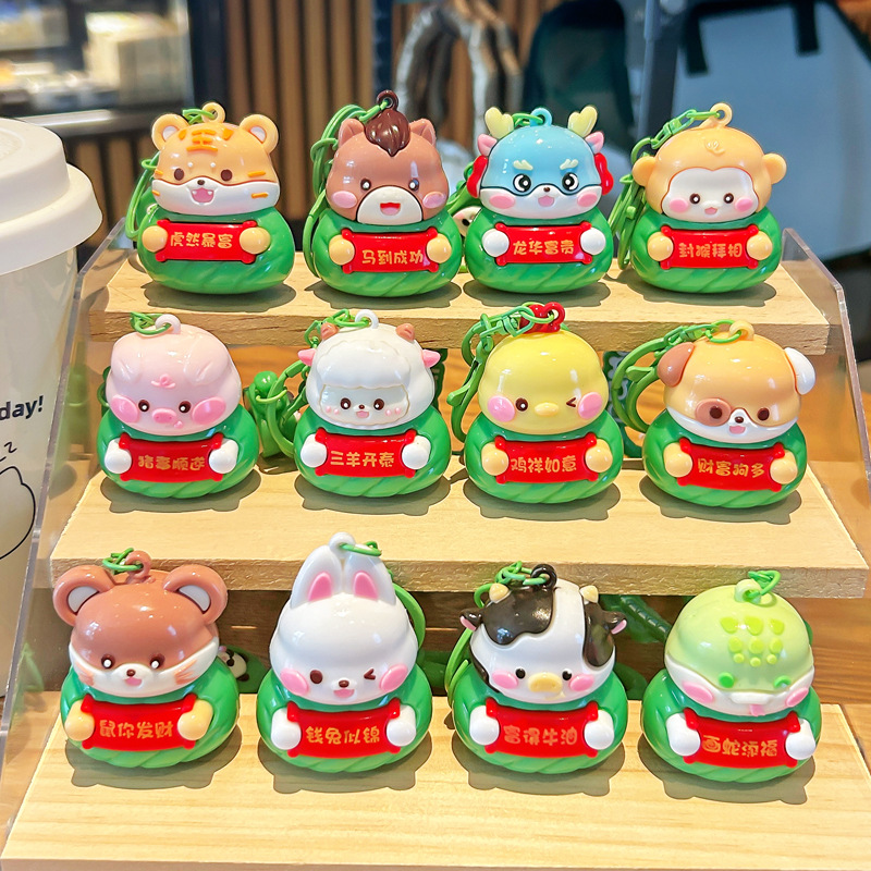 2025 nuevo estilo zodiaco zodiaco zongzi llavero lindo dibujos animados dragón serpiente caballo muñeca pareja mochila bolso colgante