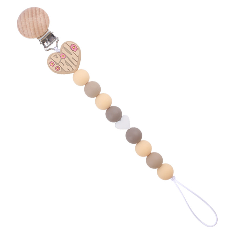 Nuevo bebé de dibujos animados amor mordedor bebé creativo DIY Pequeño amor de silicona mordedura Cadena de pezón cadena anti-caída