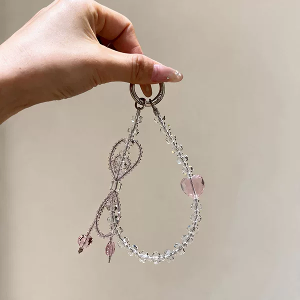 Manufacturer wholesale Korean-style phone chains, shiny pink crystal heart phone lanyards, bag charms, and bow phone pendants