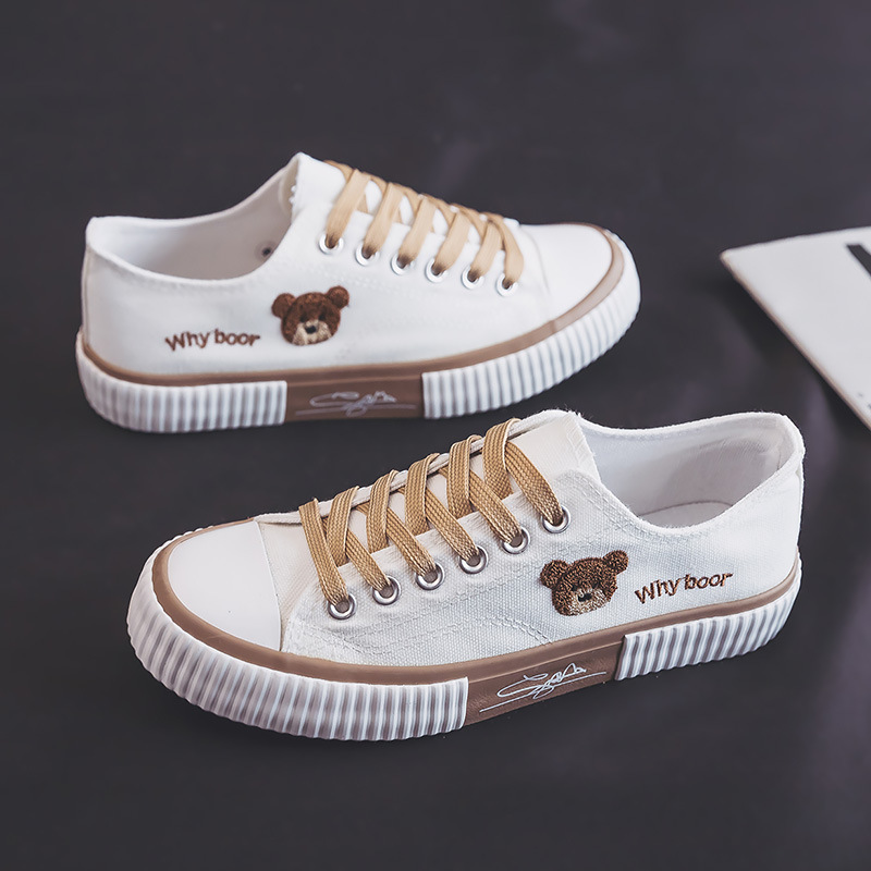 Hombres y mujeres de nicho de diseño oso bordado zapatos de lona de las mujeres 2023 nuevo estilo coreano versátil zapatillas para estudiantes moda femenina