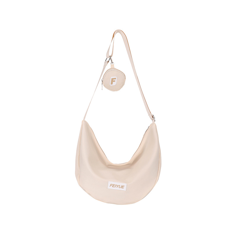 Bolsa de bolinillos de gran capacidad 2025, primavera nueva bolsa de viaje, bolsas de hombro inclinadas para estudiantes universitarios.