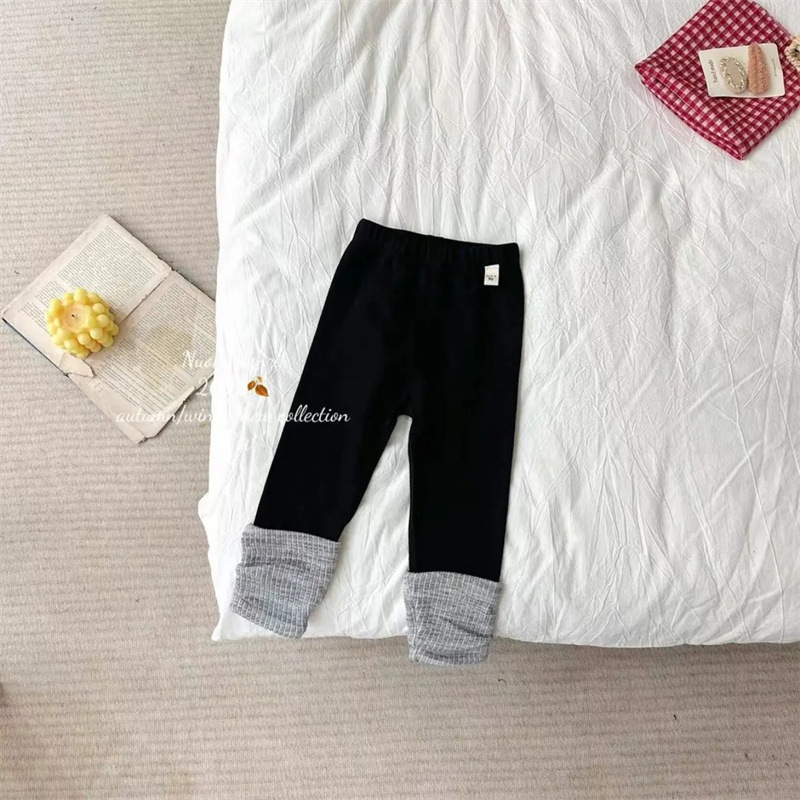 Qi Qiqi niñas dulce otoño nuevo estilo de niños coreanos estilo de empalme extranjero pantalones casuales pantalones de primavera y otoño