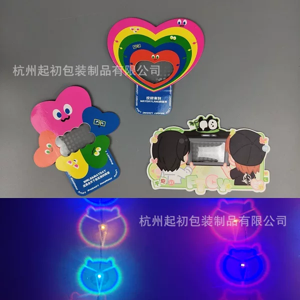 Little Black Cat Chiikawa holding a card with a diffraction pattern, creating a cute and trendy photo opportunity