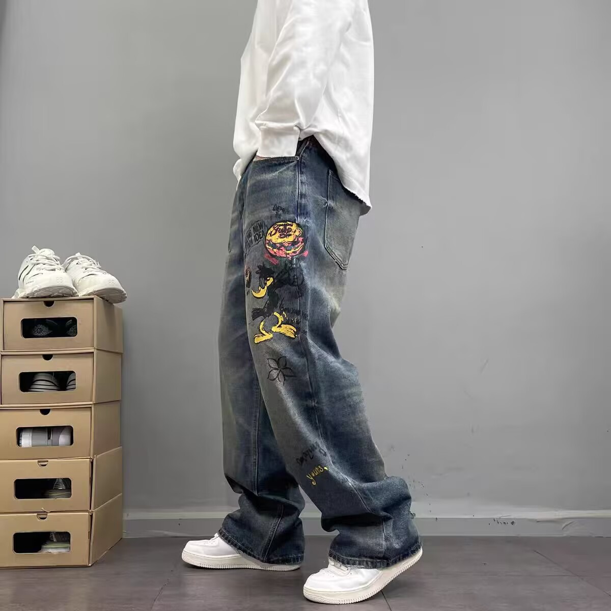 Men's Clothing Men's Trendy Edgy Graffiti Print Distressed Jeans High Street Style Loose Fitting Straight Leg Trousers For Spring Autumn_mkmklike.com