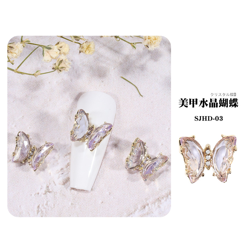 2021 nueva celebridad en línea belleza de uñas mariposa de cristal mágico estilo INS hielo tridimensional transparente Aurora diamante metal decoración de uñas