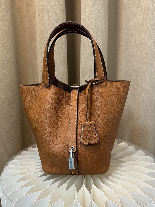 Bolsa de mano de nicho de piel de vaca de alta versión, bolsa de cestas de verduras, cuero real de gran capacidad, bolsa de cubo de alta calidad.