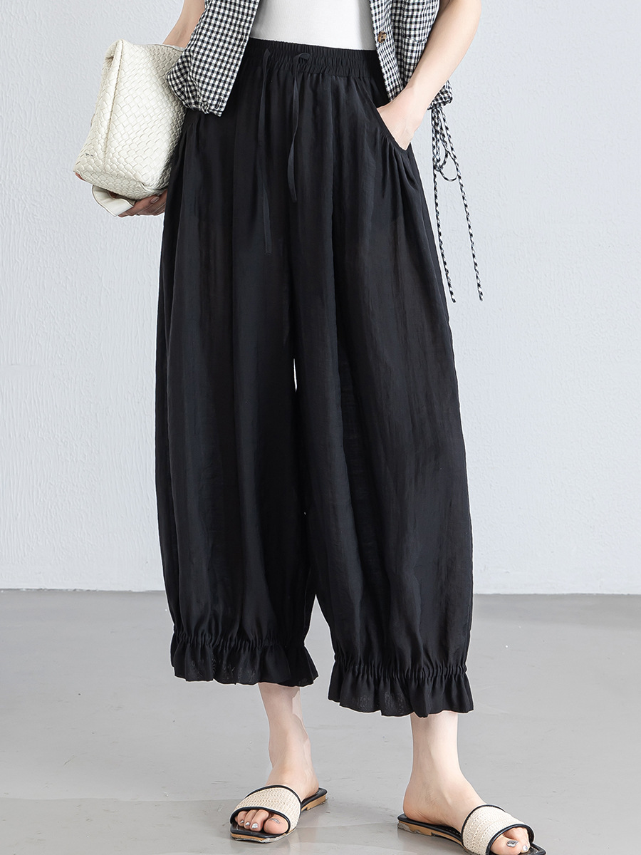 Quần culottes nữ ống rộng cạp chun co giãn, chất liệu Lyocell thoáng mát, dáng hoa tulip che khuyết điểm — màu đen