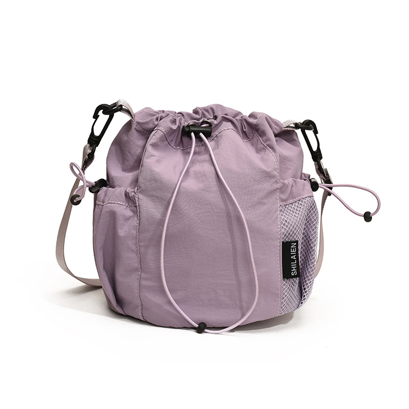 New shoulder bag ins nylon bucket bag for women with high-end feel, large capacity casual drawstring shoulder bag_voghion.com