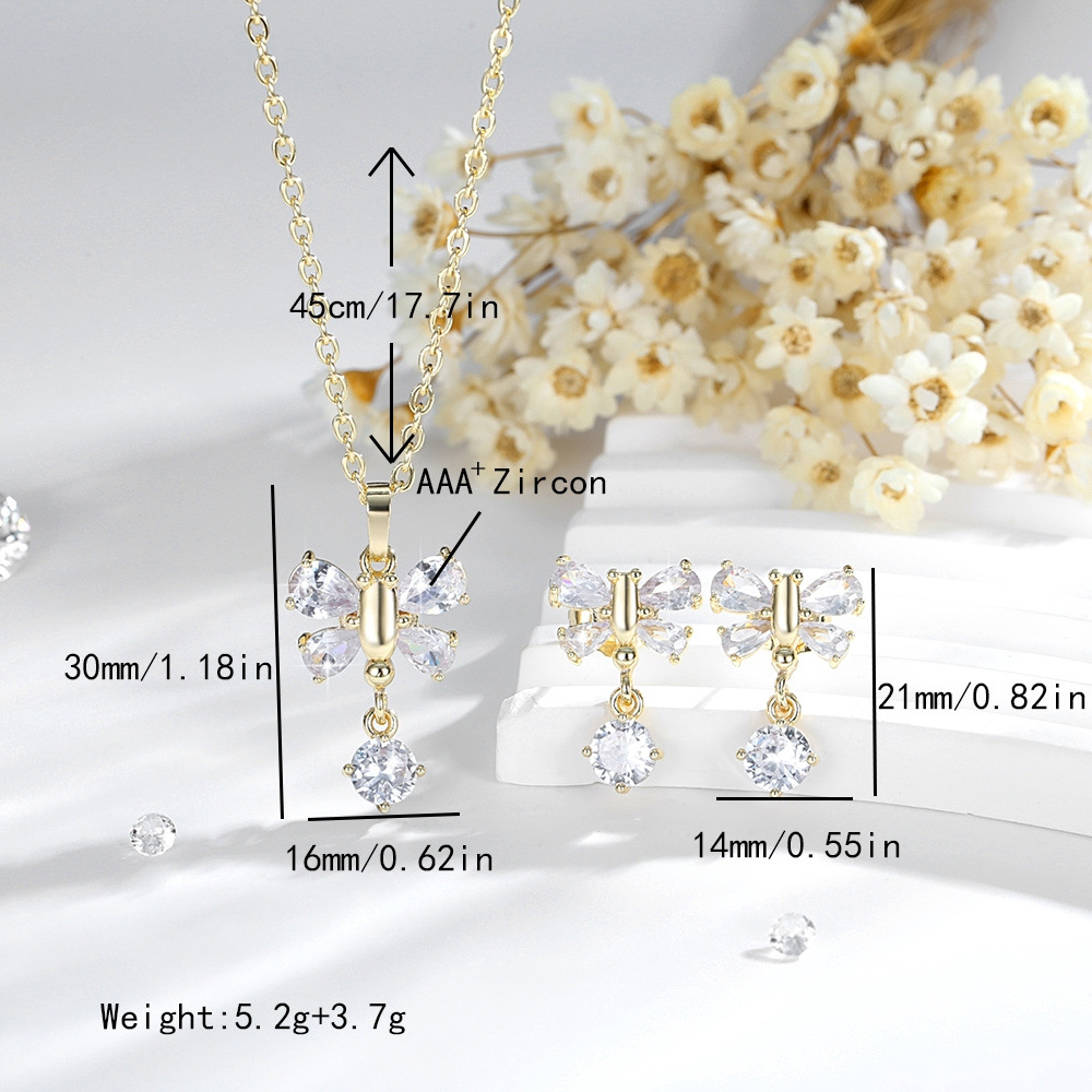 Transfronterizos de alto nivel sensación colgante mariposa conjunto de joyería de moda cobre 14K oro de color de cuentas de aretes de zircon collar