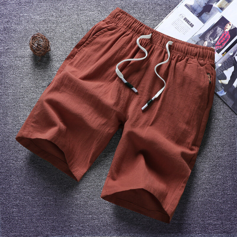 Pantalones cortos de algodón de verano tendencia masculina coreana sueltos pantalones casuales de algodón 5 pantalones de playa