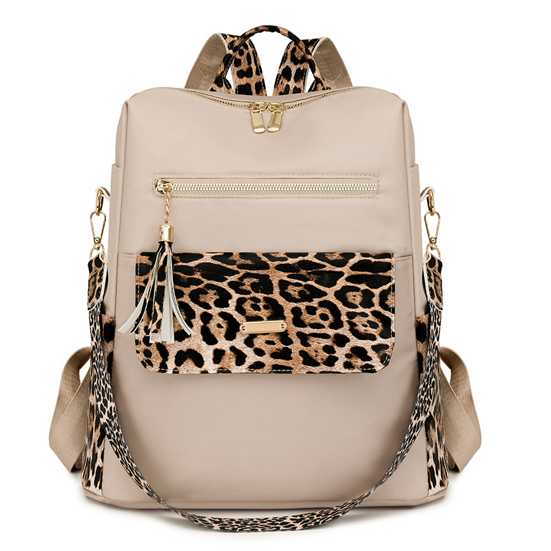 Comercio exterior nuevo estilo borla moda de gran capacidad mochila de nailon para mujer mochila de viaje ligera al aire libre simple y versátil