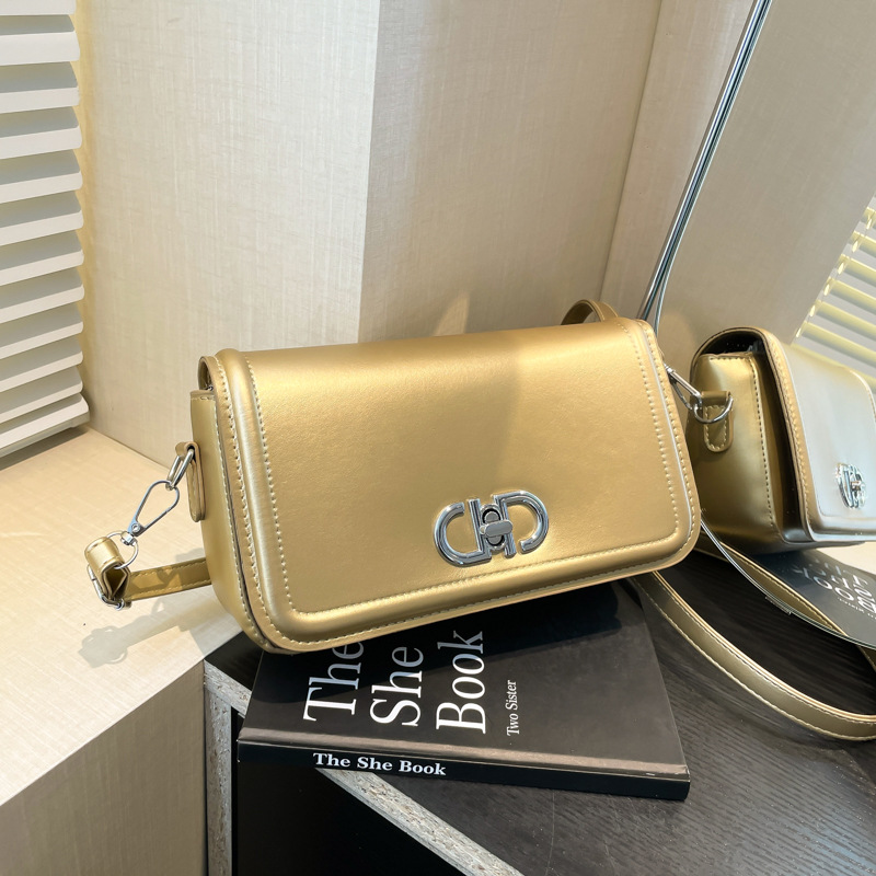 2025 primavera nuevo nicho de estilo estilo extranjero estilo de moda de color sólido bolso de bloqueo personalidad elegante bolso de hombro