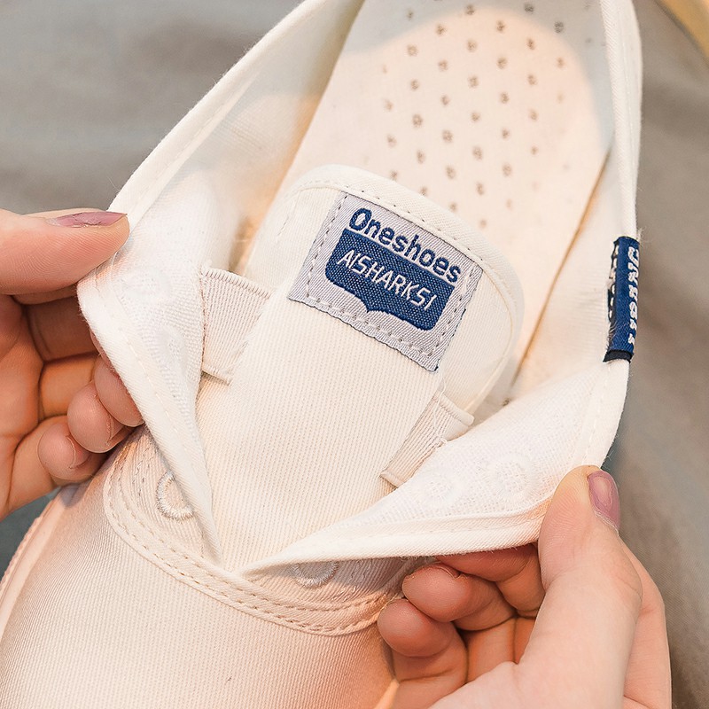 Zapatos de lona para mujer 2024 primavera nuevos zapatos blancos versátiles transpirables estilo coreano zapatos perezosos para estudiantes planos sin cordones