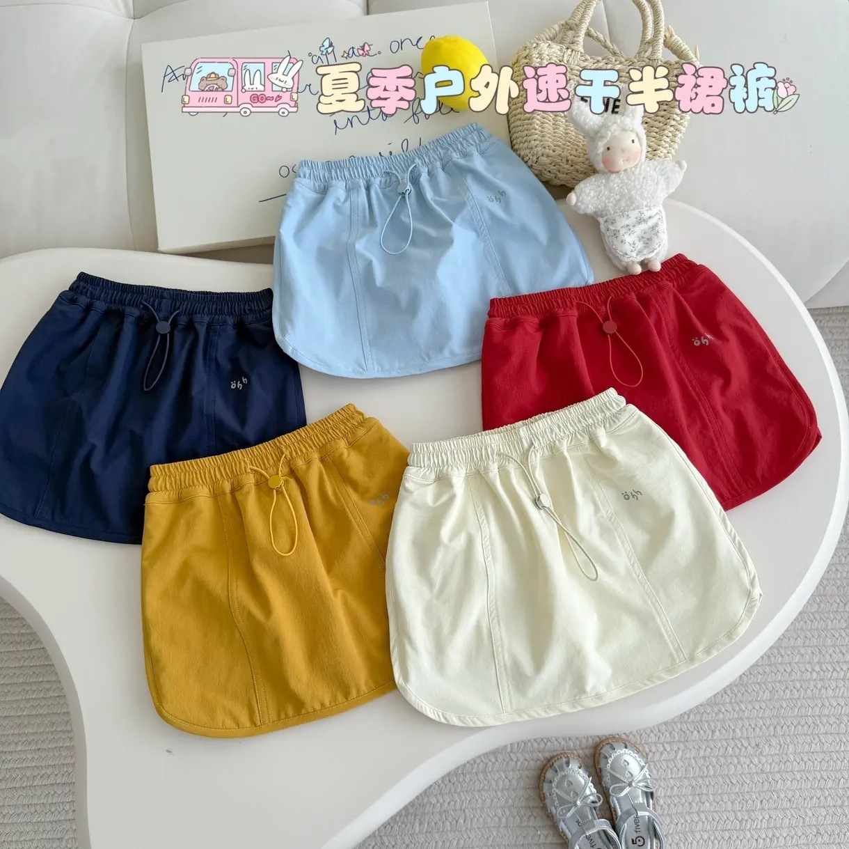 Xianning Seven Summer New Style Girls Casual All-Match Cordón Pantalones cortos de moda del tesoro femenino Falda para niños