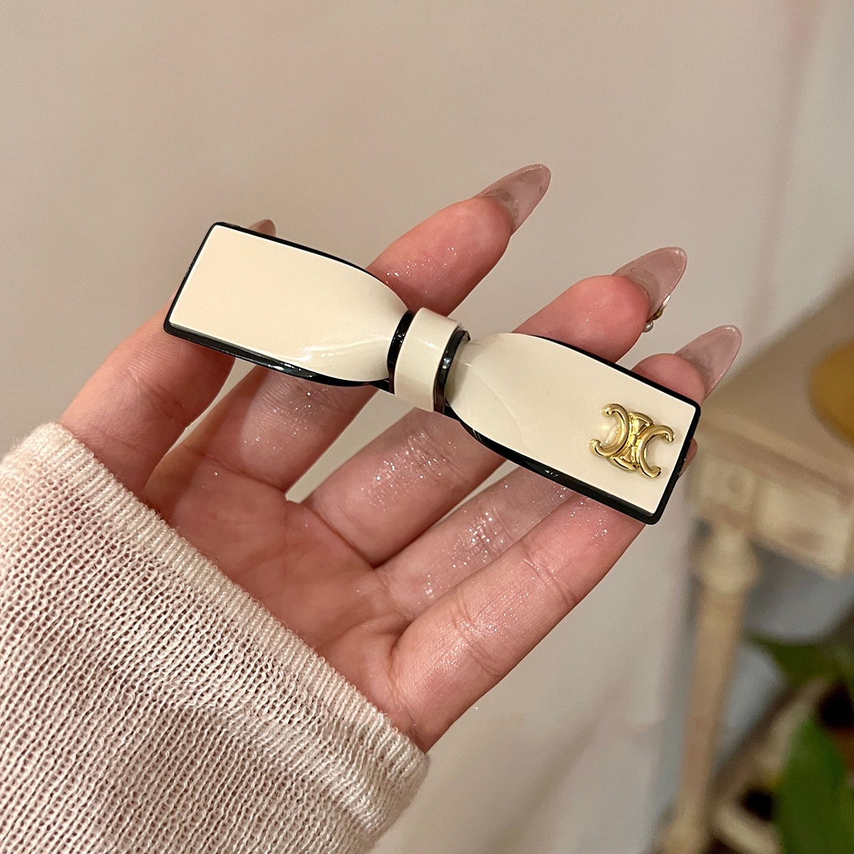 白色凯旋门金属蝴蝶结弹簧夹