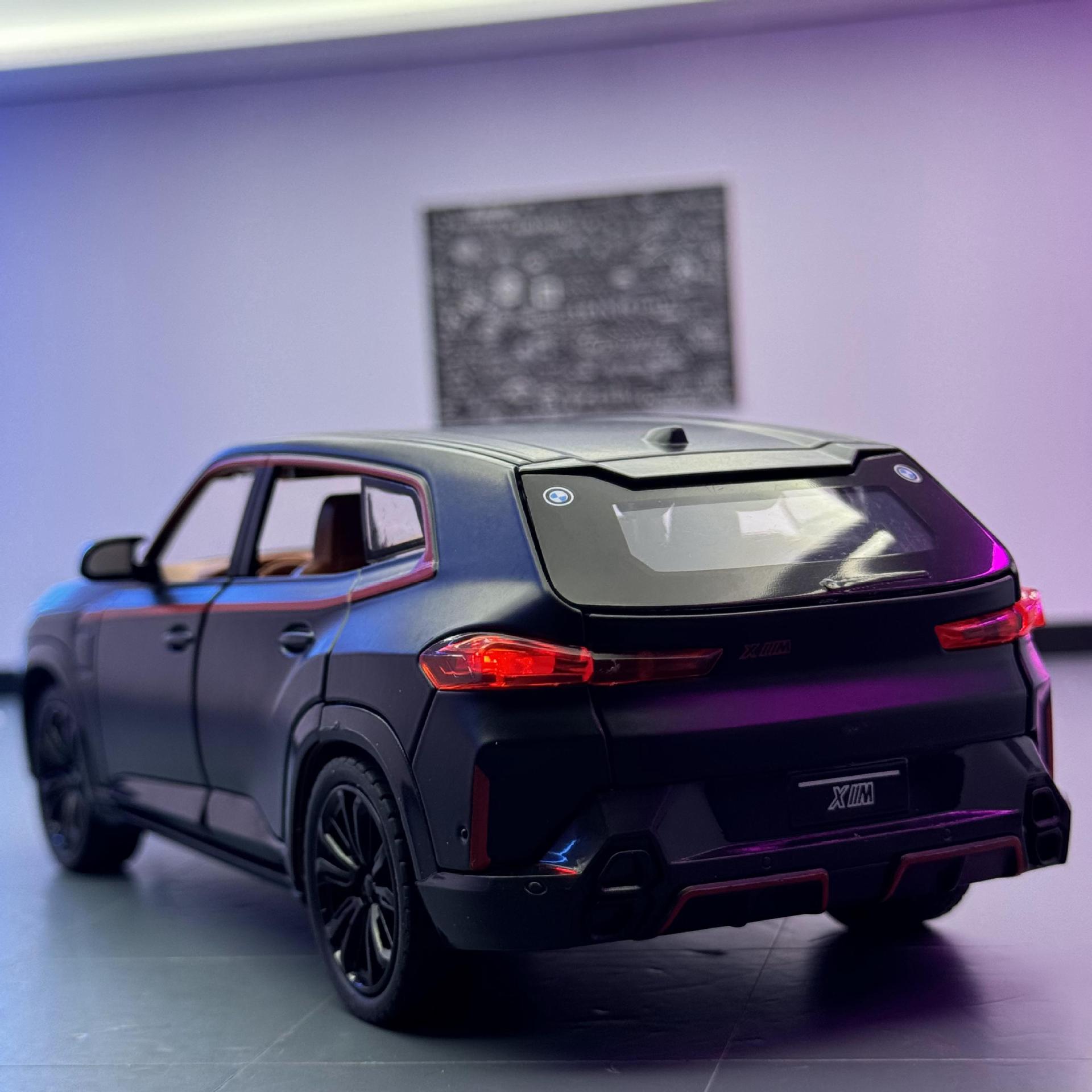 Nuevo modelo de coche de aleación Haodi 1:24 Baoma XM todoterreno con decoración de modelo de efecto de sonido de coche de juguete de retroceso superior estrella