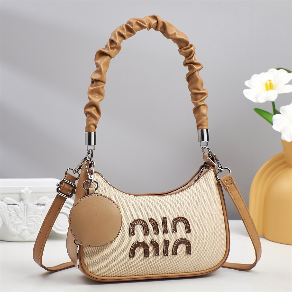 Bolso femenino de alta calidad práctico de gran capacidad para mujer bolso de bola de masa para mujer 2025 nuevo bolso de mensajero de un solo hombro