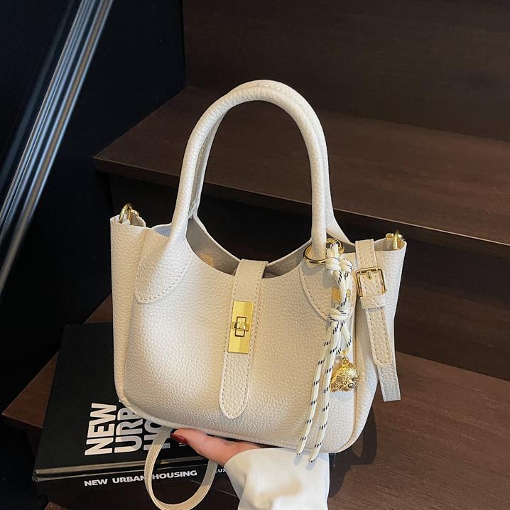 Bolso de cesta de verduras simple de comercio exterior para mujer 2025 nuevo bolso de hombro casual salvaje de moda bolso de cubo de aire extranjero