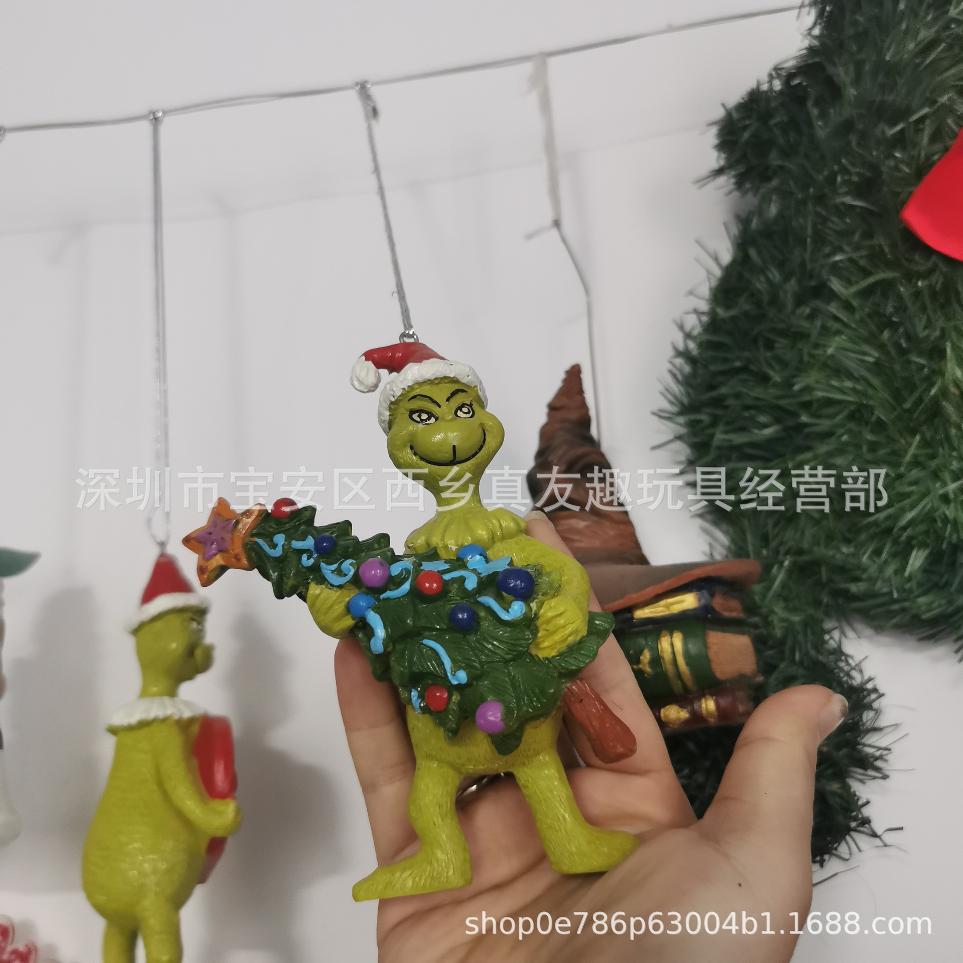 Grinch hugging tree