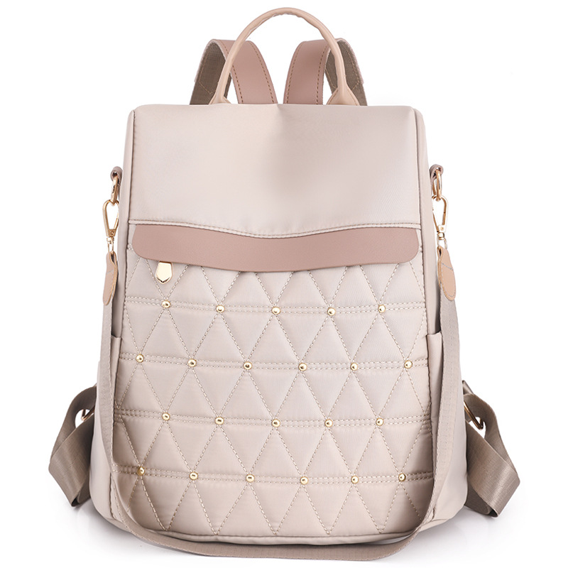 Spot wholesale 2023 nueva mochila casual para mujer de nailon moda rombo antirrobo mochila de viaje de gran capacidad