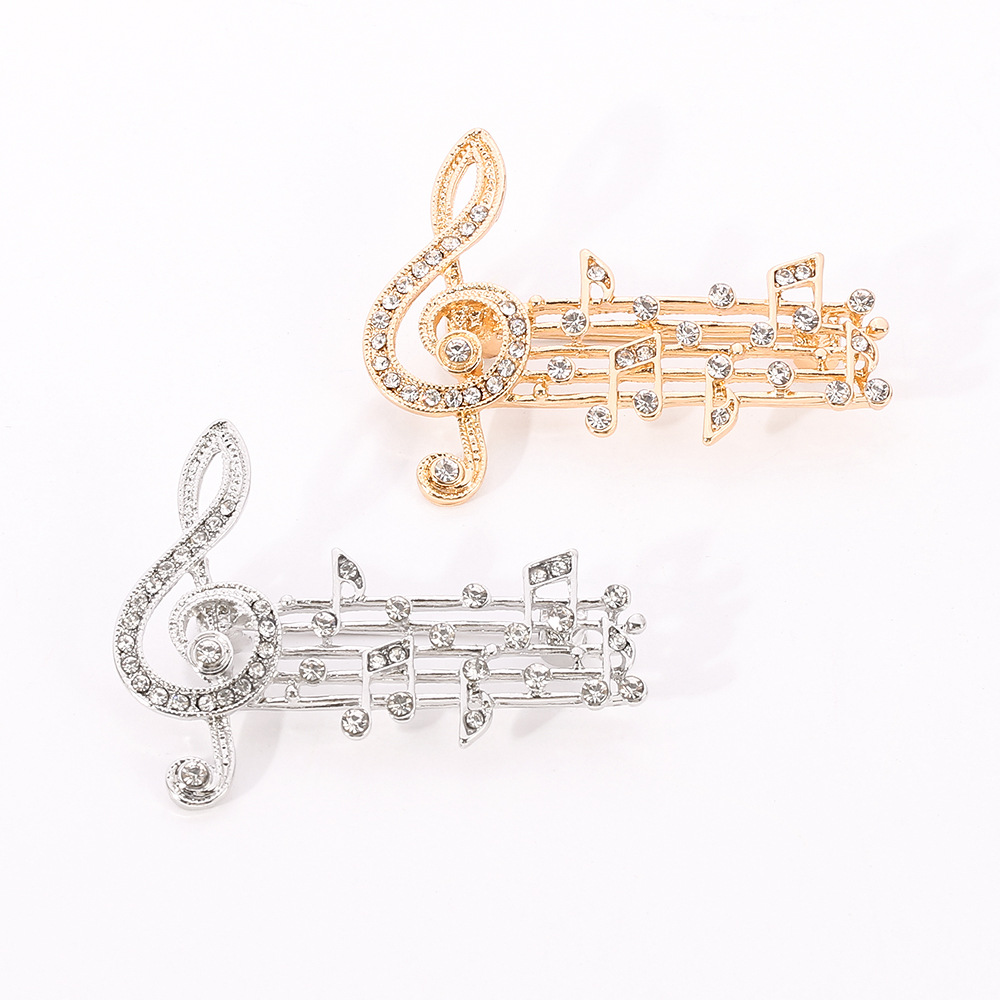 Elegant musical note brooch inlaid with...