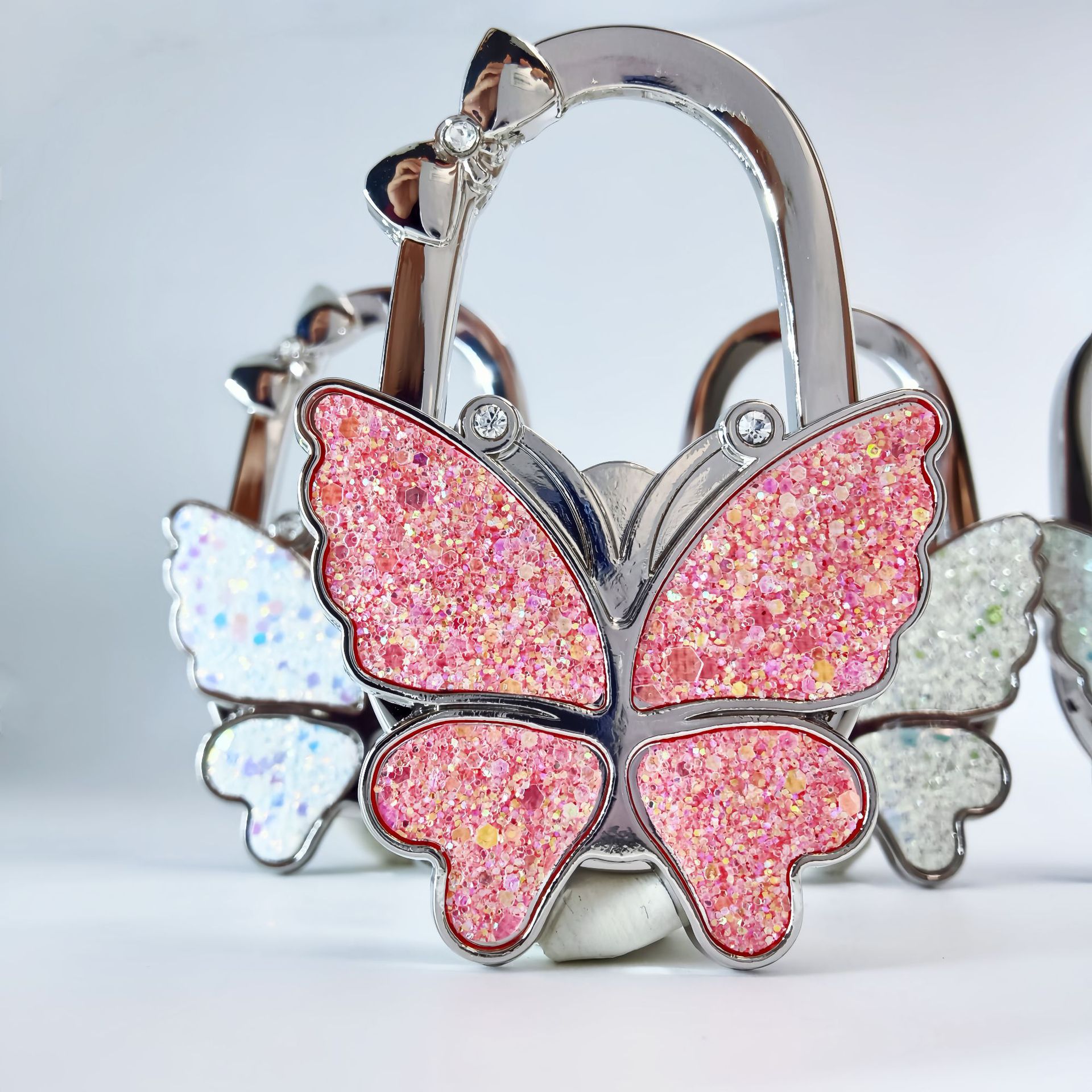 Factory direct batch of foreign trade novelty glitter butterfly hanging bag buckle handbag hook bag hook bag hardware crafts
