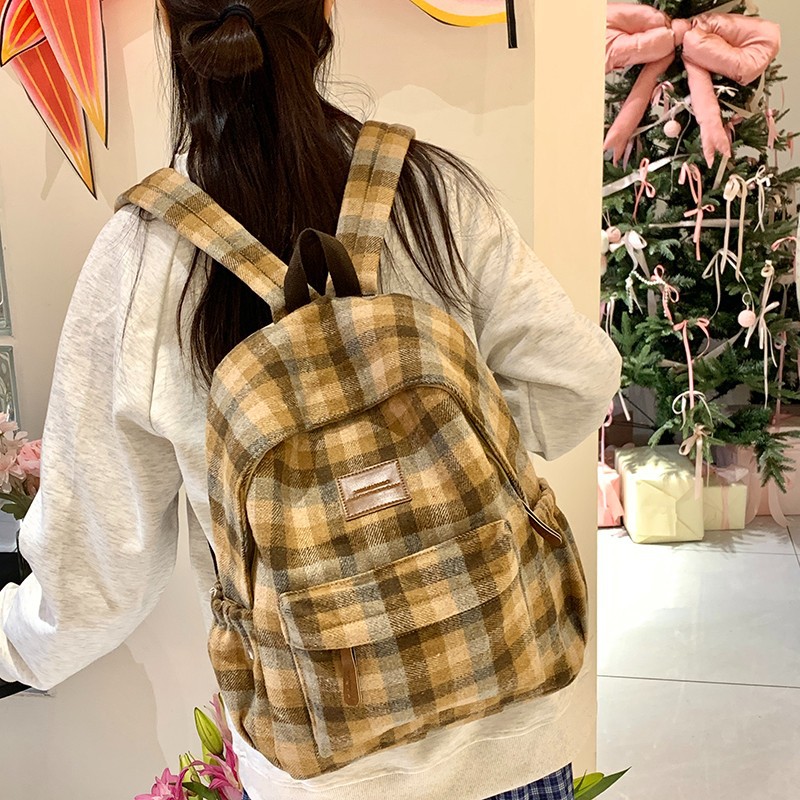 Mochila versión coreana de la versión coreana de la cuadrícula cuadrada de gran capacidad, mochilas escolares para estudiantes de secundaria y secundaria son simples y completas con paquetes de viaje de corta distancia.