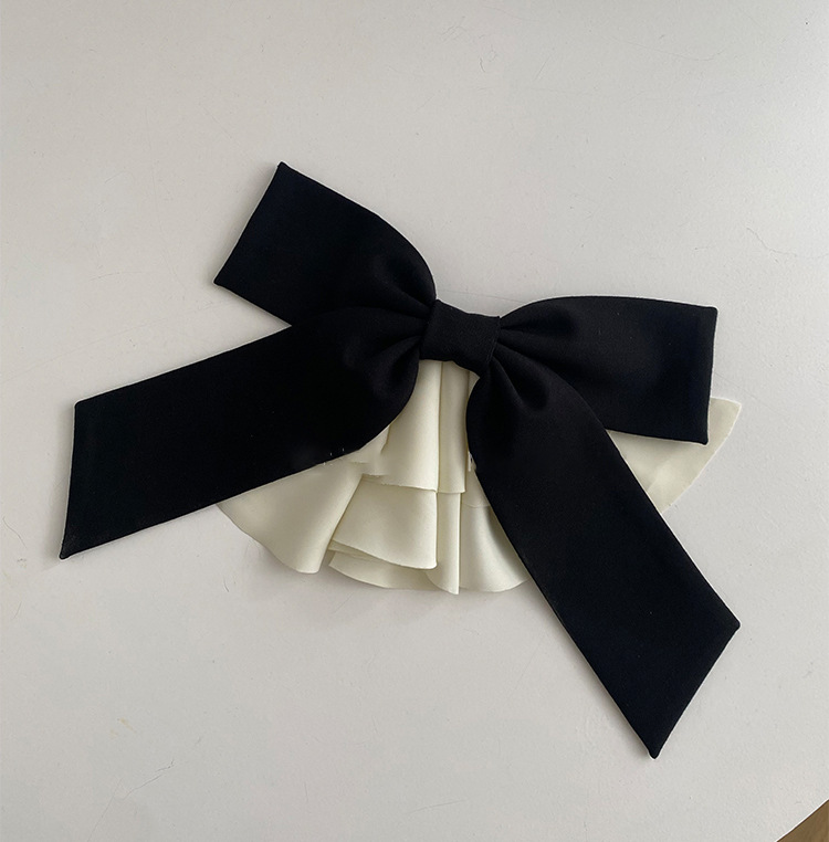 Fermaglio per capelli con fiocco in raso accessorio elegante_voghion.com
