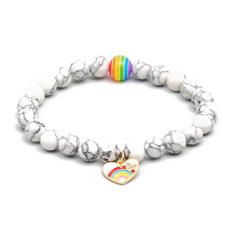 Cuentas coloridas europeas y americanas transfronterizas Ojo de tigre Pulsera de cuentas de piedra volcánica pulsera de arco iris de piedra hombres y mujeres pulsera de pareja