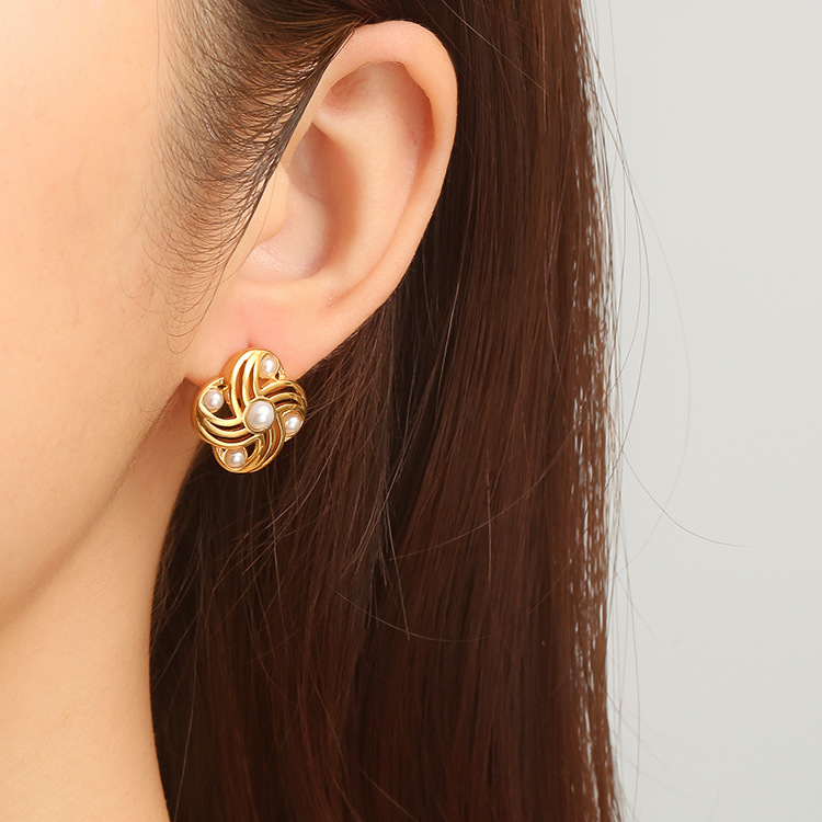 La moda europea y americana incrusta molino de viento de perlas en forma de pendientes de acero inoxidable de estilo femenino de alto nivel lujo ligero 18K pendientes