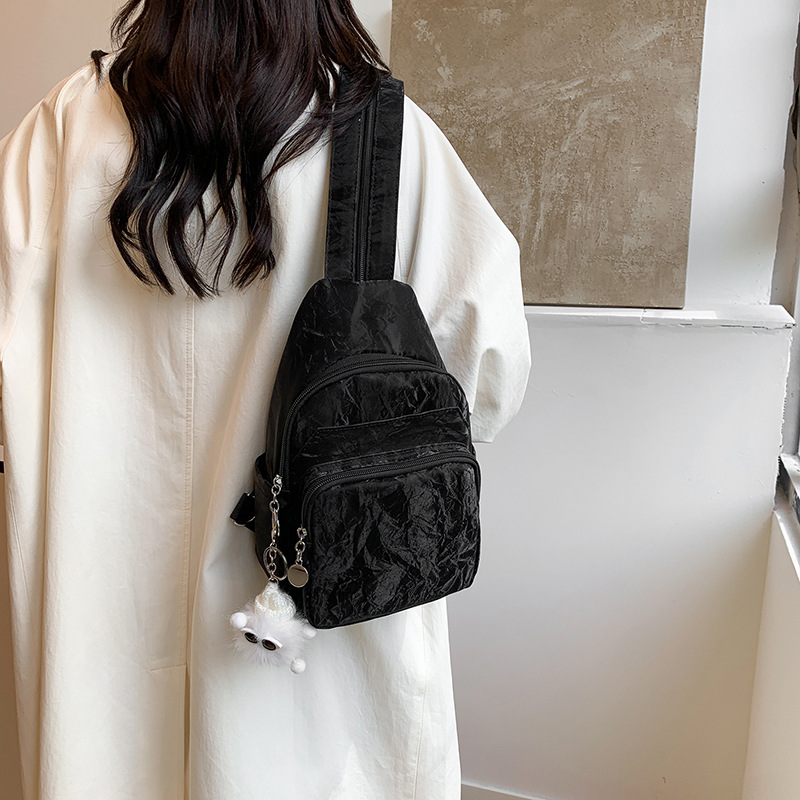 Nuevos productos de cuero suave pu doble uso bolso de pecho de moda de mujer impresión de tendencia nueva mochila china textura mochila pequeña