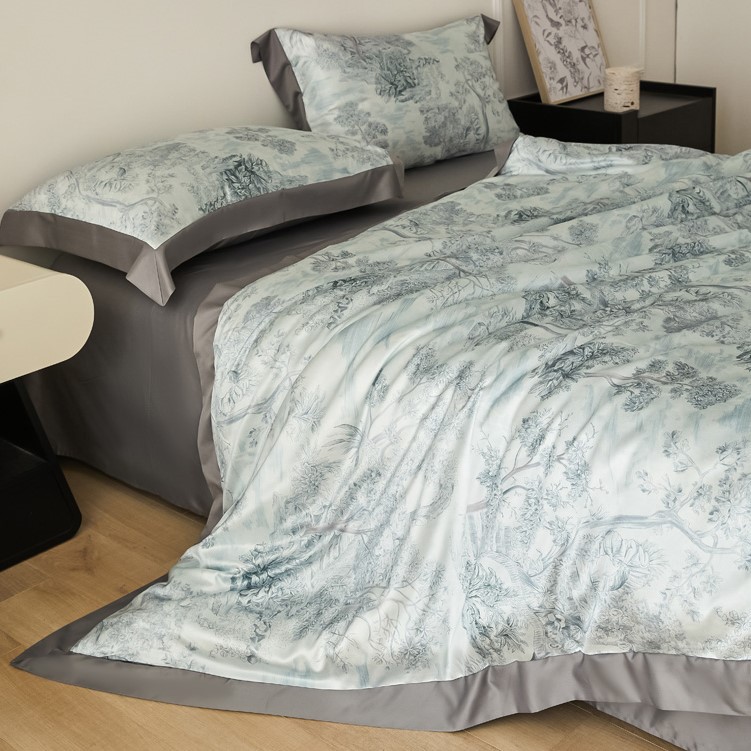 Cama de seda de hielo de verano de cuatro piezas de lujo ligero de alta gama 2025 nueva funda de edredón de sábana de tres piezas ropa de cama de seda lavada