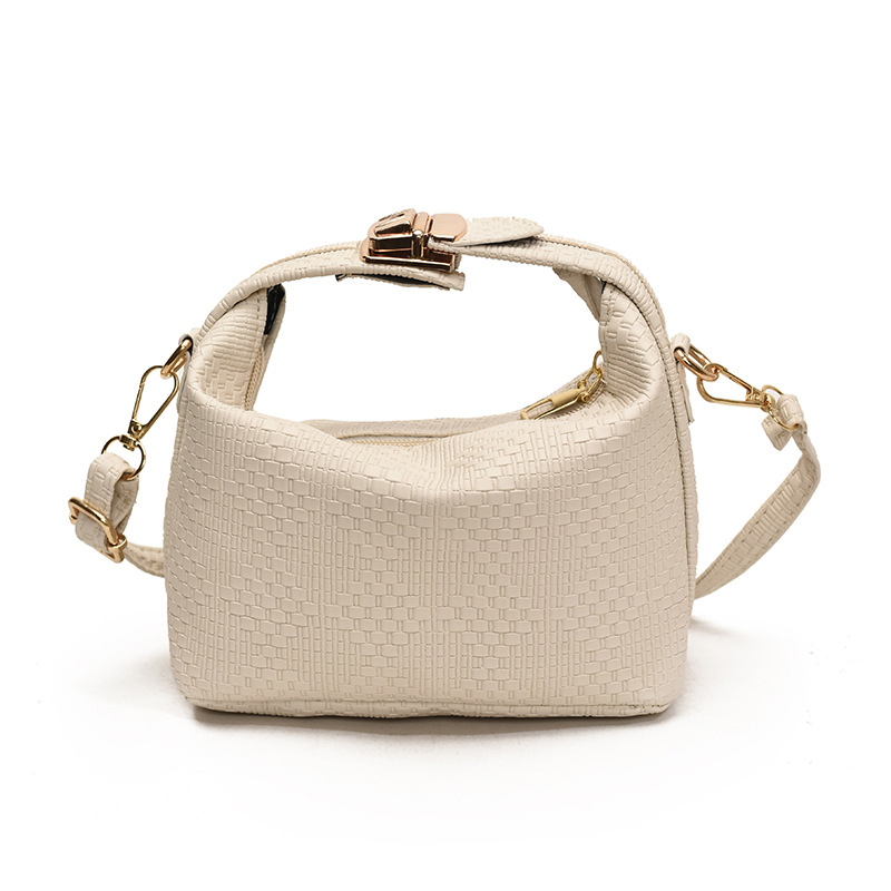 Bolsa de mano a rayas de moda coreana para mujeres otoño / invierno 2024 nuevo estilo simple bolso de hombro personalizado gran capacidad mochila