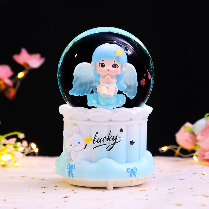 Libro rojo nuevo amanecer ángel bola de cristal decoración luminosa giratoria caja de sonido regalo de vacaciones para niños