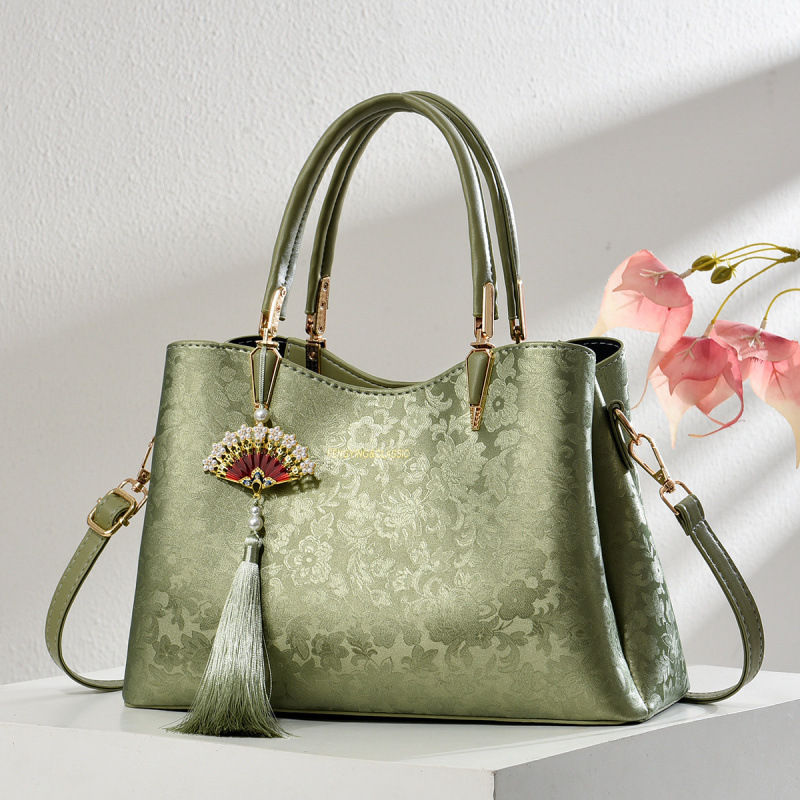 Regalo del Día de la Madre, bolso de moda de madres de mediana edad 2025, nuevo estilo nacional, bolso de mujer chino, bolso de viaje