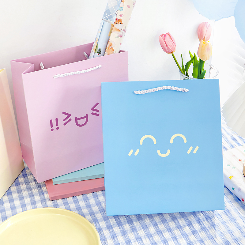 Ins simple señal de emoción bolsa de regalo de alto valor emoji regalo de cumpleaños bolsa de flores