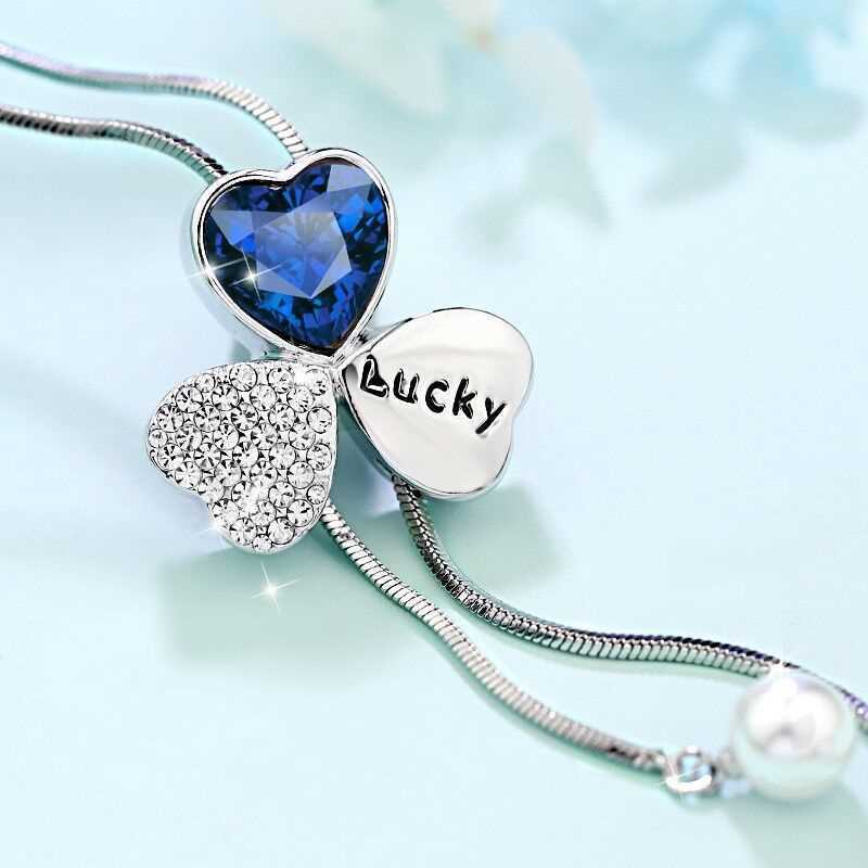 Corea del Sur moda Lucky Clover suéter cadena larga otoño Mujer Todo fósforo suéter colgante flor accesorios collar nuevo