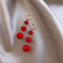 红色球球新年喜庆耳环女韩国气质长款流苏耳坠新款网红耳饰品批发