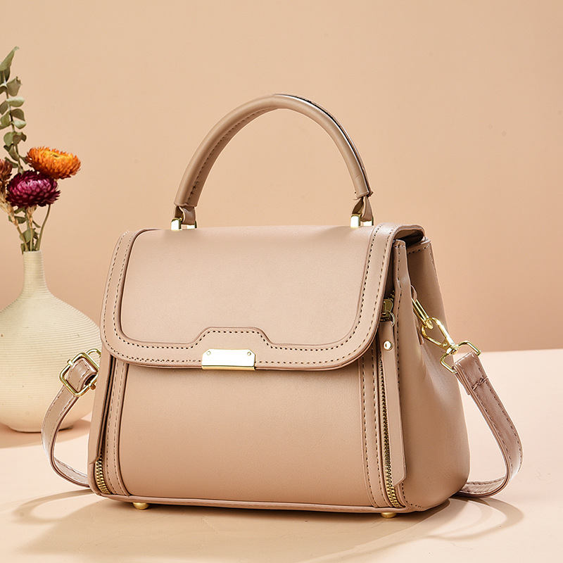 Bolso de mano bolso de comercio exterior de Taizhou bolso de mujer bolso de mensajero de un solo hombro de color sólido bolso de madre simple de moda de todo fósforo bags