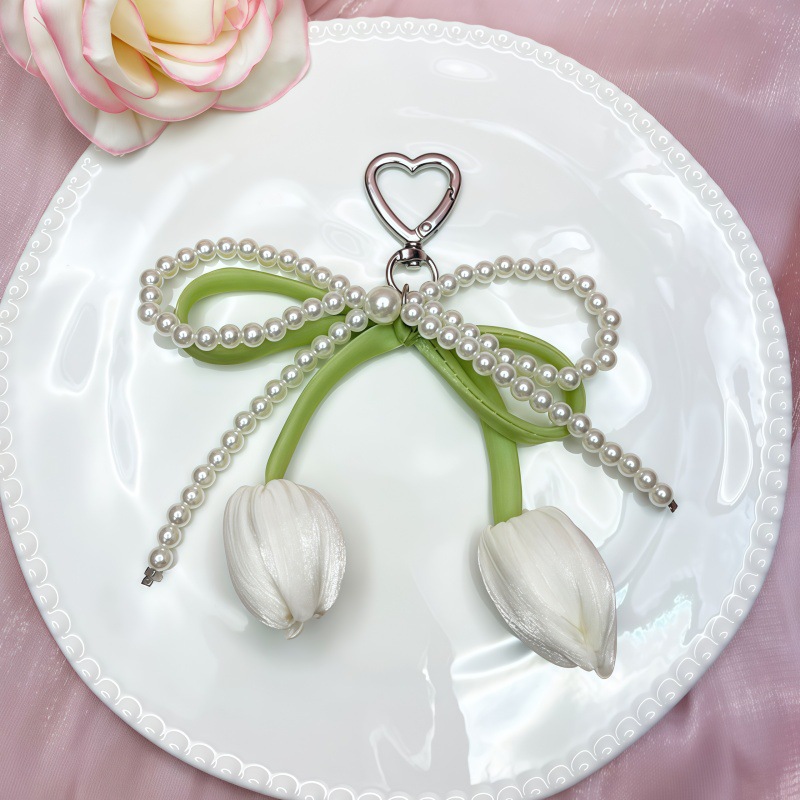 Venta caliente transfronteriza colgante de tulipán colgante de lazo llavero decoración de bolsos de mujer accesorios perlas al por mayor