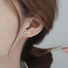 Metal sophisticated small design cute earrings, simple and elegant design, flowered