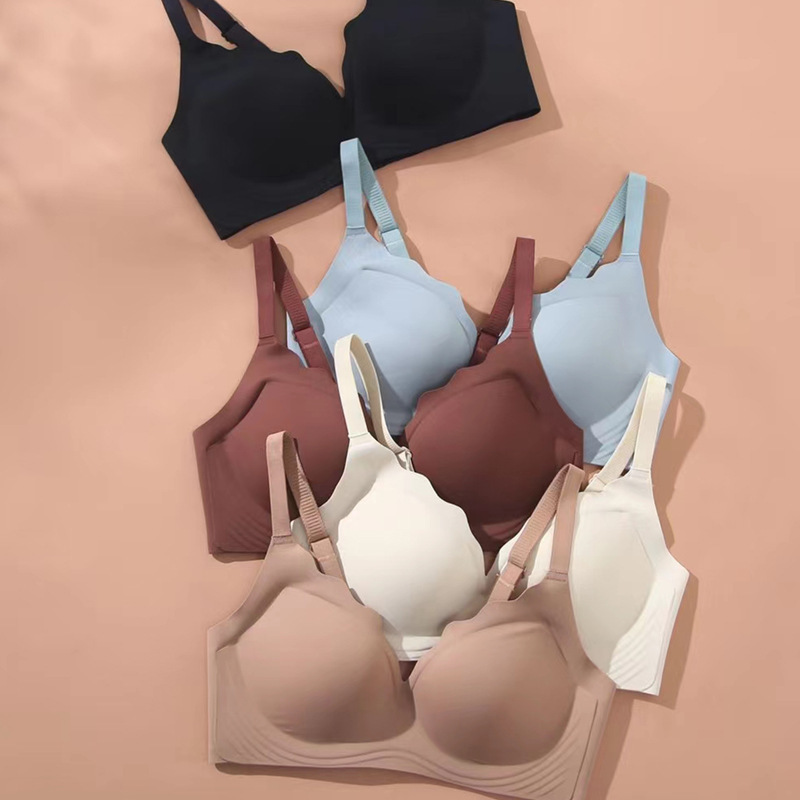 Ropa interior inalámbrica sin costuras de las mujeres empuja hacia arriba el pecho pequeño tira de jalea soporte suave tridimensional taza fija colección superior sujetador de mama