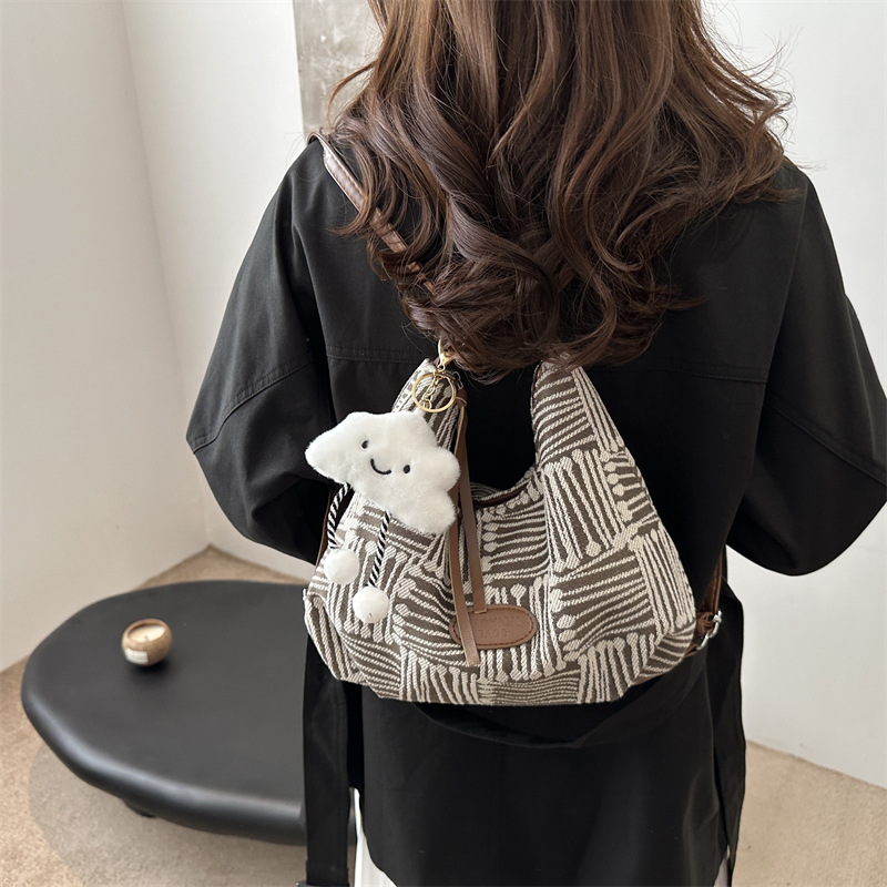 Bolso de lona para mujeres 2024 nuevo otoño bolso universitario de doble propósito mochila de hombro de viaje universal mochila de hombro