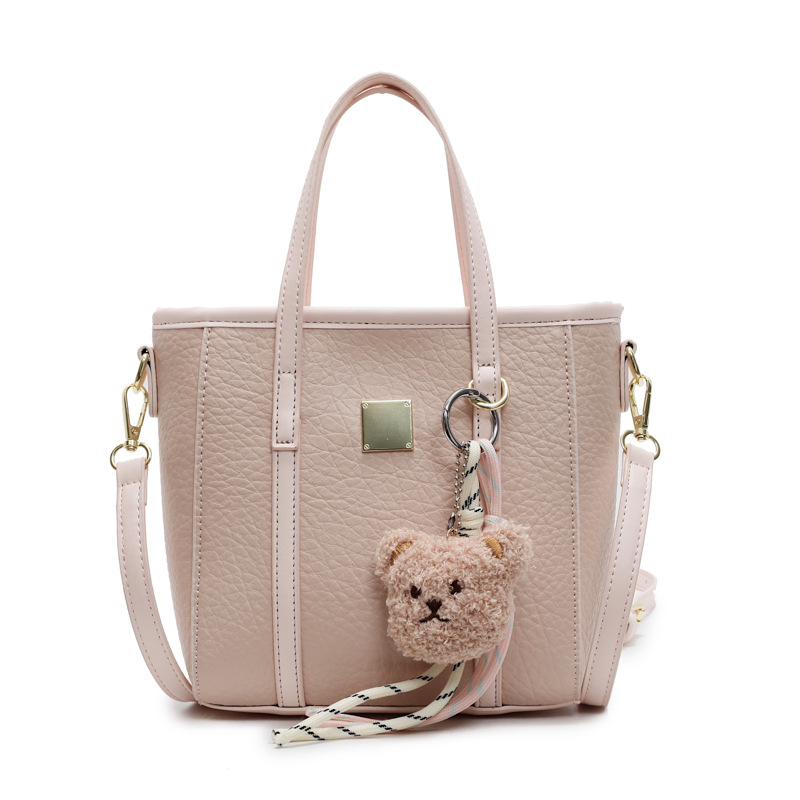 Bolsa de cubo de mano de comercio exterior para mujeres 2025 nuevo nicho de diseño exterior bolso de hombro de estilo universal bolso de mochila de moda casual