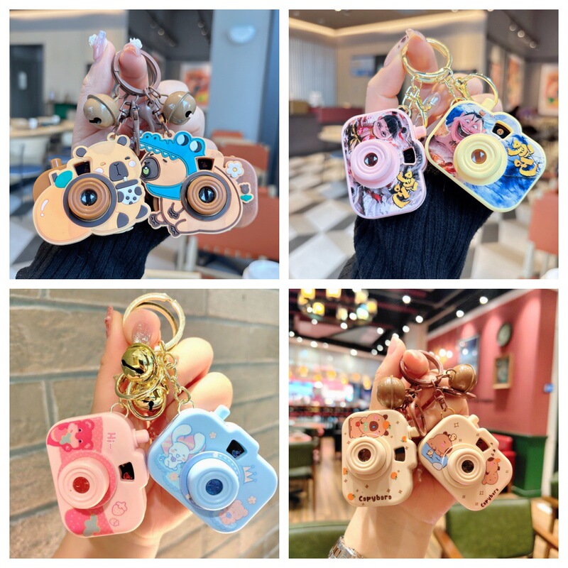 Creative cartoon small doll projection camera series keychain kapibala strawberry bear schoolbag gift pendant batch