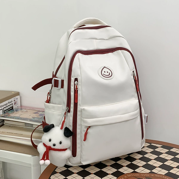 White and red puppy pendant with red rope