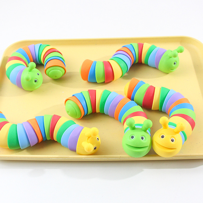 Explosiones transfronterizas simulación descomprimida arco iris sonriente nariz oruga peristáltica puzzles pequeños juguetes para niños animales mayoristas
